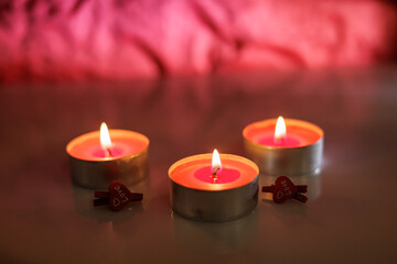 Burning Romantic Candlelight On red Background.