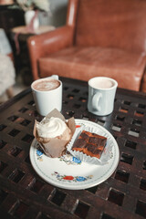 Baked sweets and lattes with foam art at a bed and breakfast