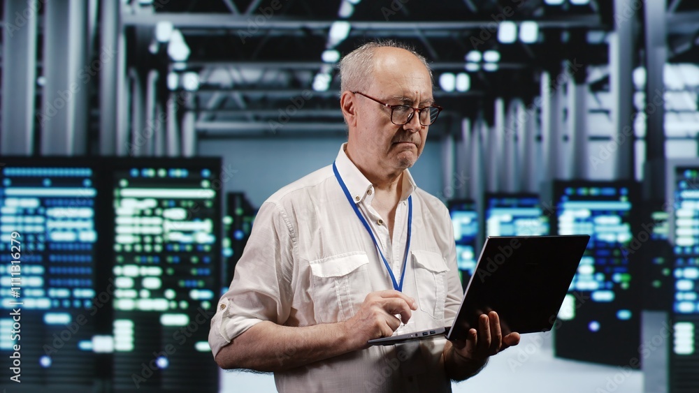 Aufkleber expert it professional navigating network of servers in industrial workplace. technician with laptop