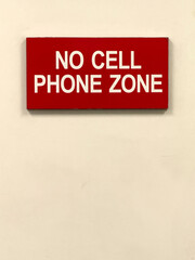 NO CELL PHONE ZONE sign at a medical facility