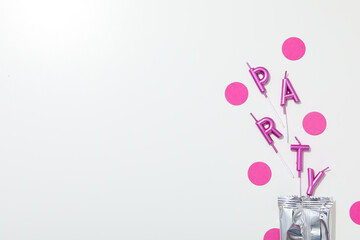 Concept of party decor and confetti, balloons and candles.