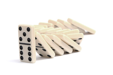 Domino effect. Tiles falling on white background