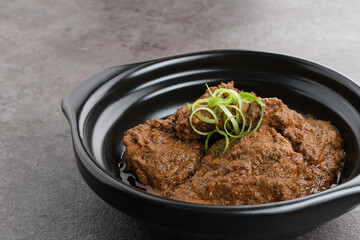 Rendang Daging Sapi, traditional food from Padang, Indonesia. Beef stew with spices, herbs and coconut milk
