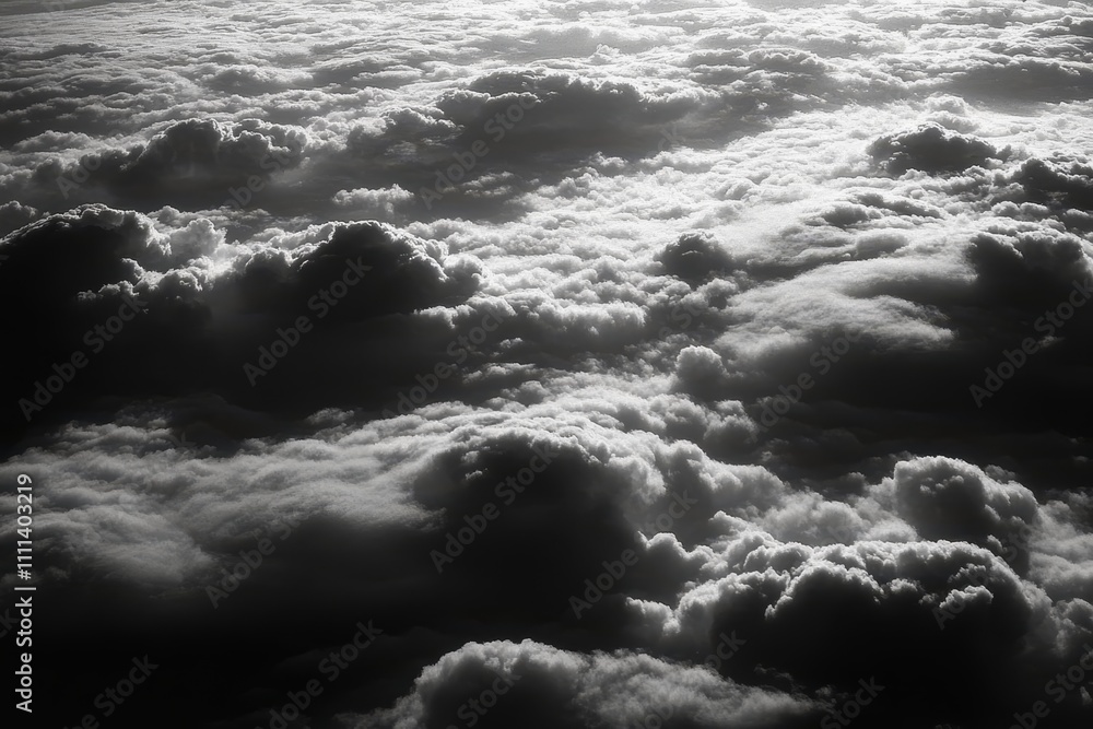 Poster ethereal black and white cloudscape from above with soft shadows creating a dreamy atmosphere and a 