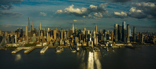 MAY 1, 2023, NEW YORK, NY, USA - sunset dusk view over Hudson River from Weehawken, NJ of New York City