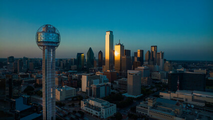 JULY 16, 2023, DALLAS, TEXAS - aerial view at sunset of Reunion Tower and Dallas Skyline