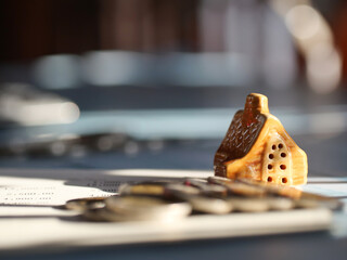 Loan for purchasing a home with a house and money as components. Business and finance concept.