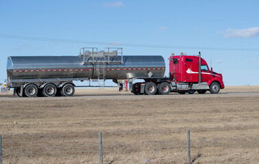 Heavy Cargo on th eroad. A truck hauling freight along a highway. Taken in Alberta, Canada