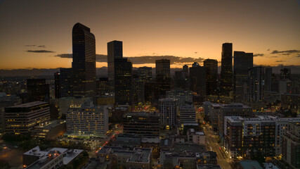 SEPTEMBER 30, 2023 - DENVER, CO., USA - sunset on Denver skyline looking west towards Rocky Mountains