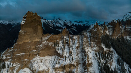 OCTOBER 12, 2023, RIDGWAY, CO., USA - sunset view of Cimarron Mountains near Ridgway Colorado in autumn with fresh snow - "Court House" view