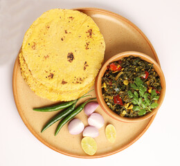 Makki Ki Roti Sarson Ka Sag is basically Corn floor flat bread curry using mustard greens respectively. Popular Punjabi food