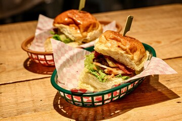 Two Gourmet Burgers in Serving Baskets © David