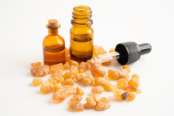 Frankincense or olibanum aromatic resin isolated on white background used in incense and perfumes.