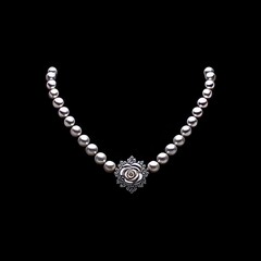 Elegant pearl necklace with rose pendant.
