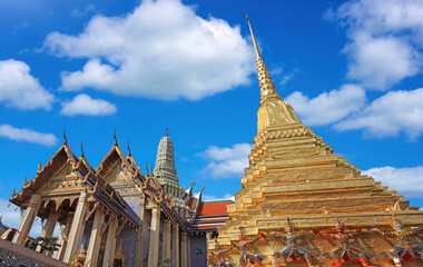 Naklejka premium Wat Phra Kaew (The Temple of the Emerald Buddha) in Bangkok, Thailand is a sacred temple and it's a part of the Thai Grand Palace, the Temple houses an ancient Emerald Buddha.