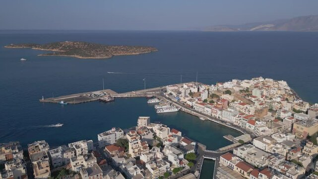 Revealing the charm of Agios Nikolaos in Lasithi, with its picturesque lake, vibrant harbor, and stunning coastal views