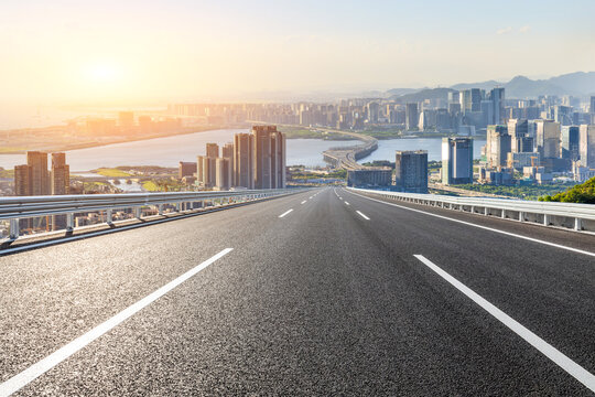 Fototapeta Asphalt highway road and city skyline with modern buildings scenery in Shenzhen. Urban road background.