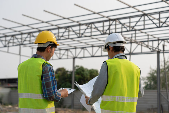 inspector engineer and owner project is inspecting construction and quality assurance new house. Engineers or architects or contactor work to build the house before handing it over to the homeowner - Powered by Adobe