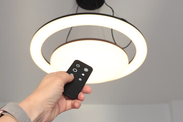 LED ceiling light with smart remote control. Energy saving. Clean planet and environmental protection. 