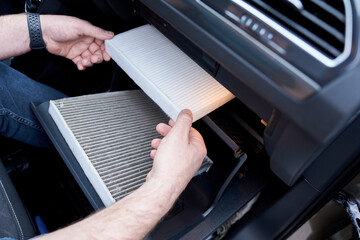 Car air filter in auto repair shop. Auto service industry. Automotive background