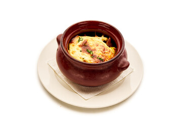 A bowl of food is on a white plate