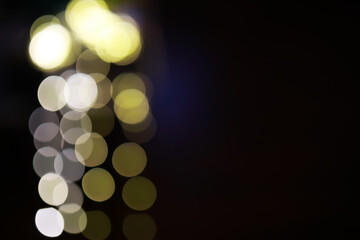 Fototapeta premium Abstract Bokeh Light Background with Golden and White Circular Blurs