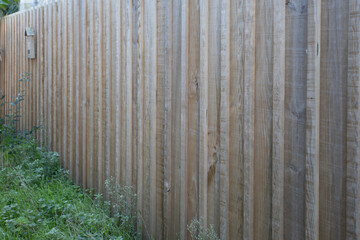 wall wooden fence high with wood structure street barrier house protect view home garden