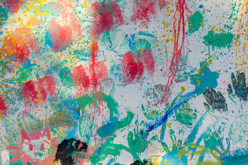 A colorful painting with splatters of paint on it