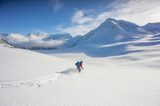 First skier makes fresh tracks on the Spearhead Traverse, Whistler.
