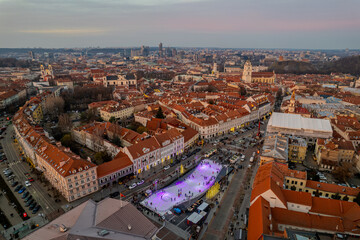 Aerial winter evening view of Vilnius old town, Christmas Open Air Ice Skating Rink, Lithuania