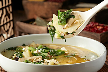 Potato,tofu and cabbage stew with sesame flowers