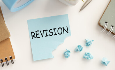 Word writing text Revision. Business concept for action of revising over someone on the table