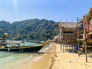 Moken people's village, souvenir shops, houses along the beach in Surin island 