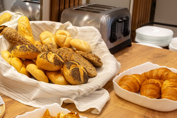 Assorted bread basket, hotel breakfast