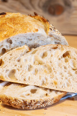 Homemade bread, sourdough wheat loaf with seeds