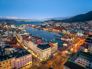Fototapeta premium Night aerial of historic city Bergen, Norway colourful wooden harbour 