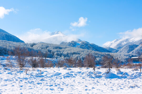 travel ski background with slopes, snow mountain peak, copyspace - Powered by Adobe