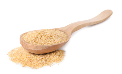 Spoon with raw wheat groats isolated on white