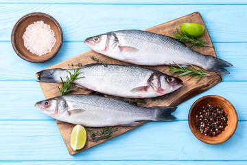 Raw sea bass fish photography . Top view