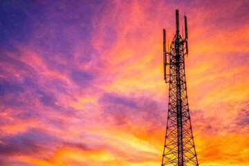 Telecommunication tower silhouette against vibrant sunset sky.
