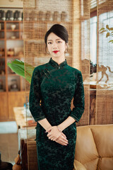 Cheongsam beauties drinking tea in teahouse