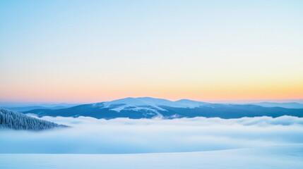 Obraz premium Serene morning sky transitioning from golden to pastel blue over tranquil mountains