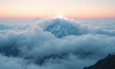 Naklejka premium The summit of a mighty mountain is shrouded in a thick layer of cloud and mist, but its snowy peak glows with an ethereal light , wilderness, glowing