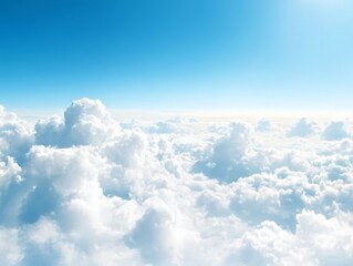 Big billowing clouds floating across a bright blue sky, showcasing a peaceful and serene natural landscape perfect for sky and cloud lovers.