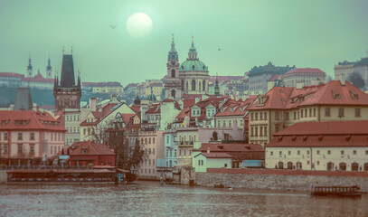 Fototapeta premium Charles Bridge in mystical Prague in foggy weather.