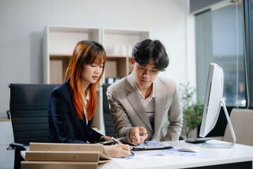 Female discussing new project with male colleague. Young woman talking