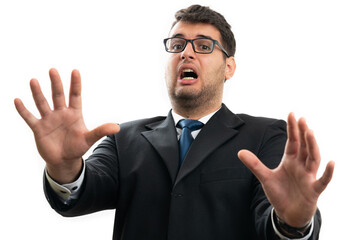 Scared businessman yelling making stay away gesture with hands