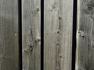 natural wood wall - The wooden wall shows planed wood, the surface of which is heavily compacted...