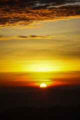 Breathtaking sunset over mountains landscape photography nature's beauty serene atmosphere peaceful viewpoint tranquility concept