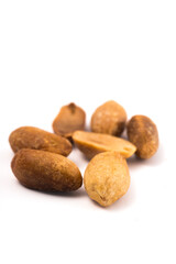 Obraz premium Cedar nuts on a white background. Clipping path included.